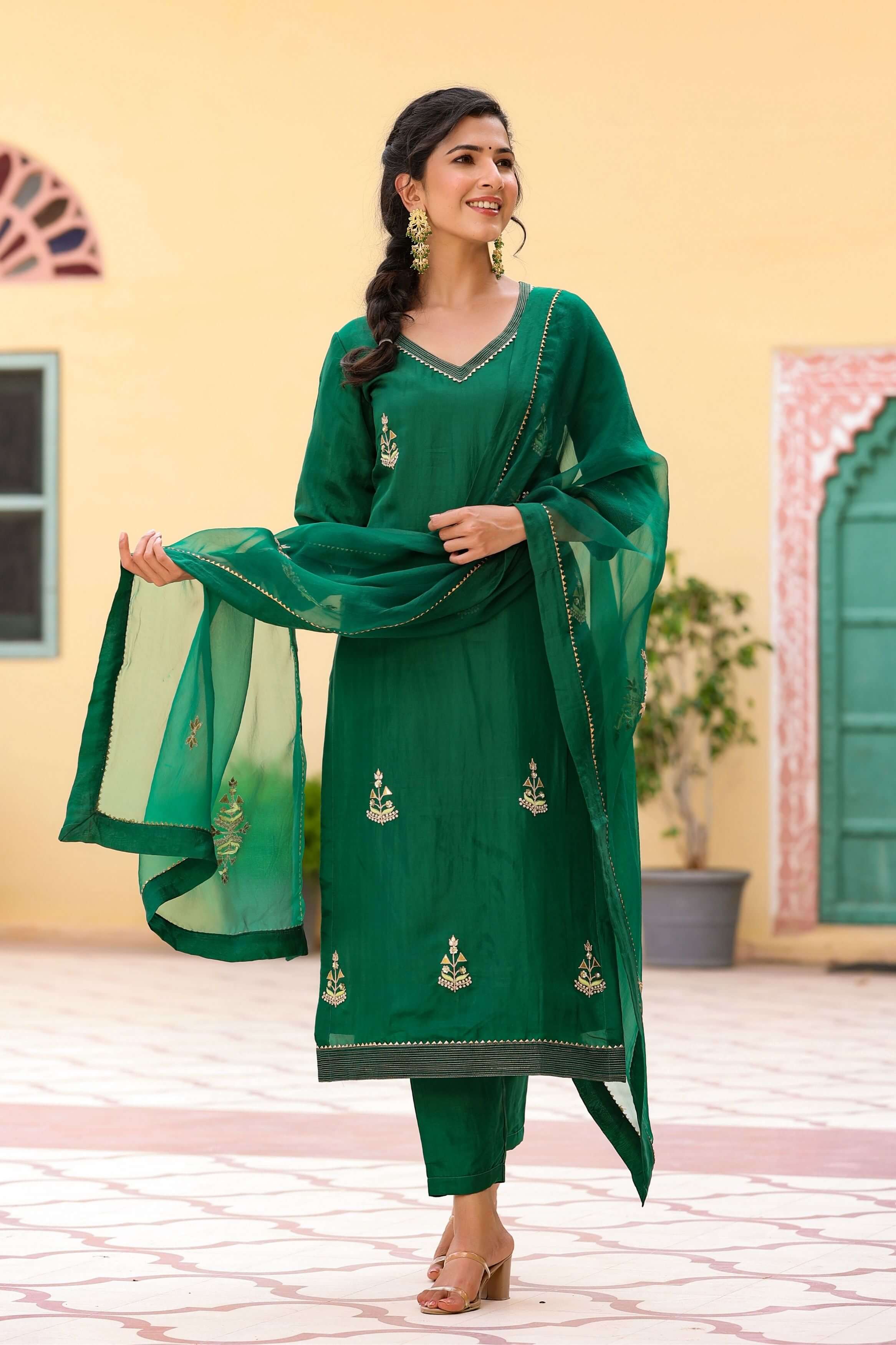 Green silk shop suit